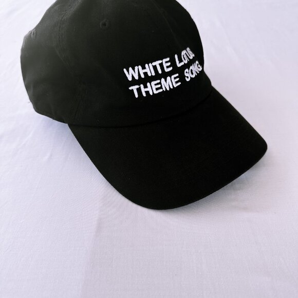 Intentionally Blank White Lotus Theme Song Slogan Hat SOLD OUT - Picture 2 of 5